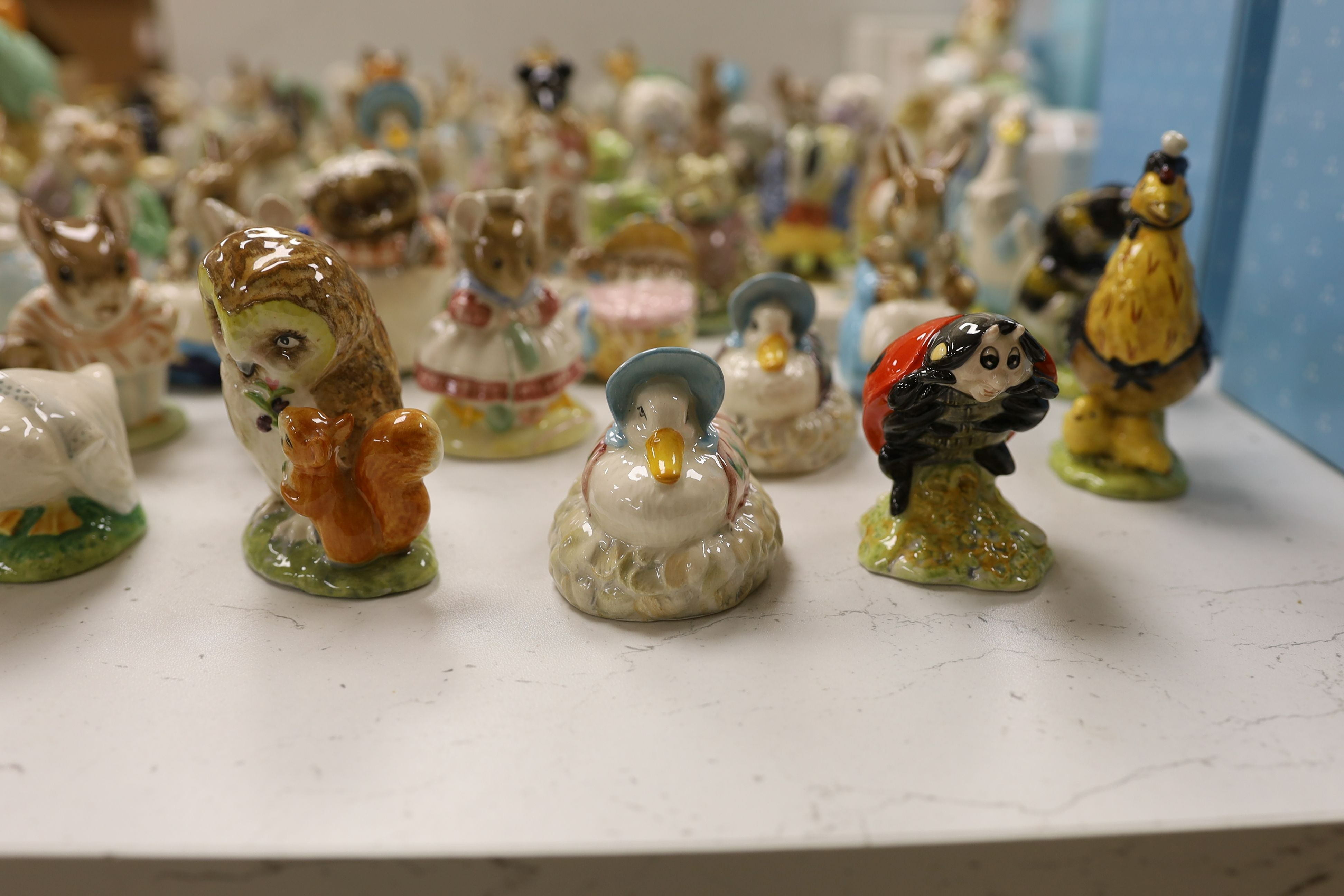 A large collection of various Beswick Beatrix Potter figures, money boxes etc.